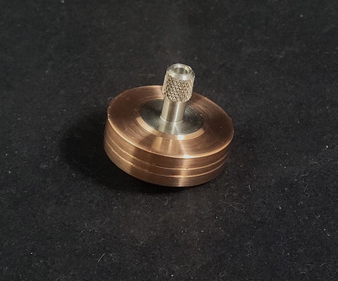Copper spinning top