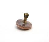 Machined copper and brass spinning top