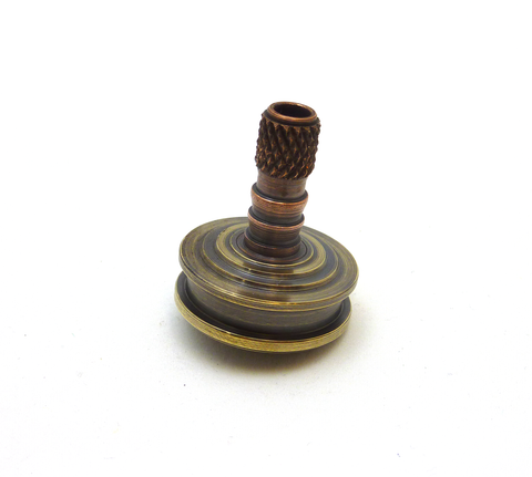 Machined copper and brass spinning top
