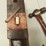 Machined brass Put and Take gambling spinning tops - Butterfield Machine