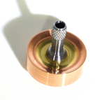 Copper, brass and stainless steel spinning top