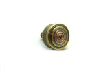 Machined brass and copper spinning top