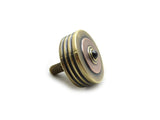 Machined brass and copper spinning top