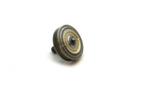 Machined brass spinning top