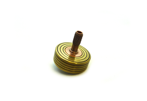 Machined copper and brass spinning top