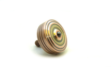 Machined copper and brass spinning top
