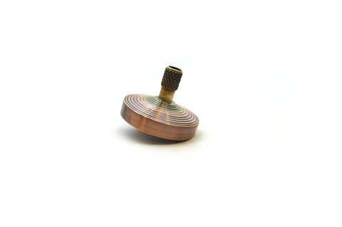 Machined copper and brass spinning top