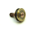 Machined copper and brass spinning top