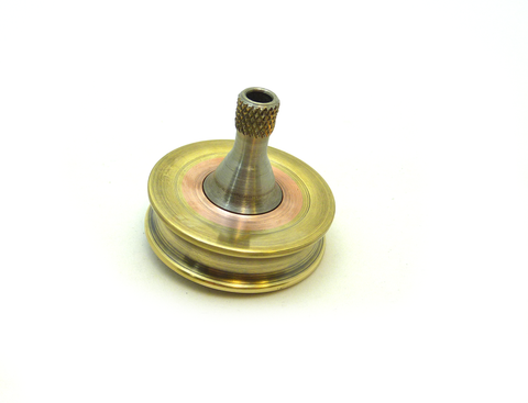 Machined copper and brass spinning top