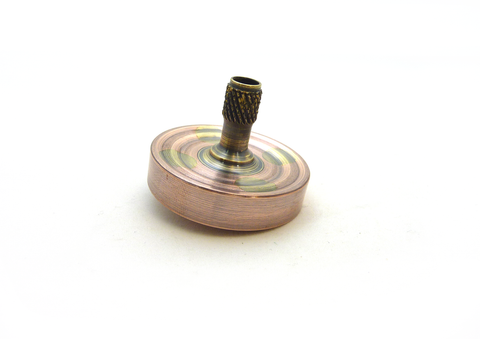 Machined copper spinning top