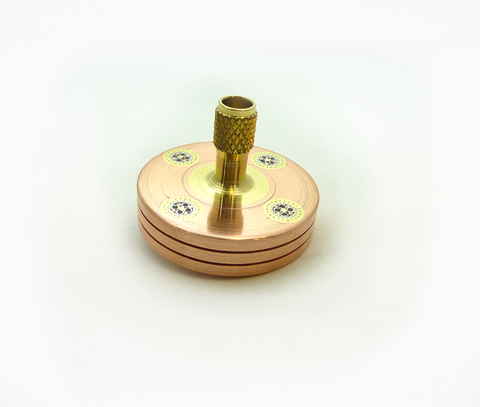 Machined copper spinning top